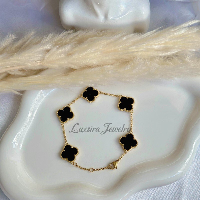 Black Clover 18K Gold Plated Bracelet 18K gold plated bracelet with black clover charm on white display